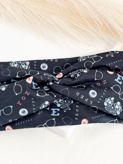Black Optometry Headband – Eye Care Hair Accessory