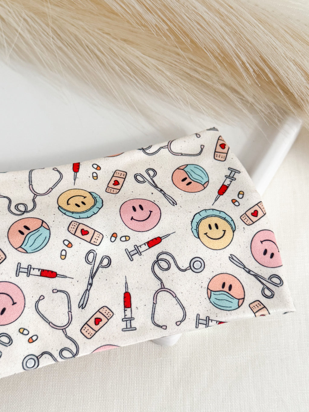 Medical smiles print twist headband for nurses and healthcare workers – handmade by Headband Studio