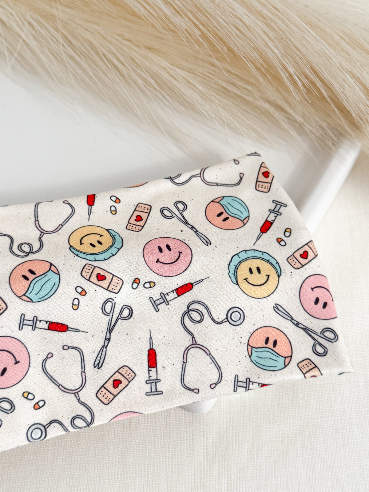 Medical smiles print twist headband for nurses and healthcare workers – handmade by Headband Studio