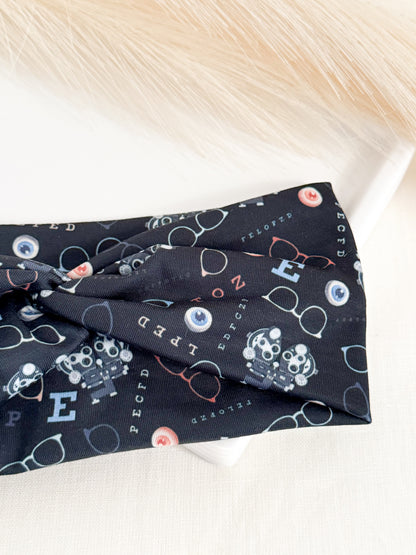 Black Optometry Headband – Eye Care Hair Accessory