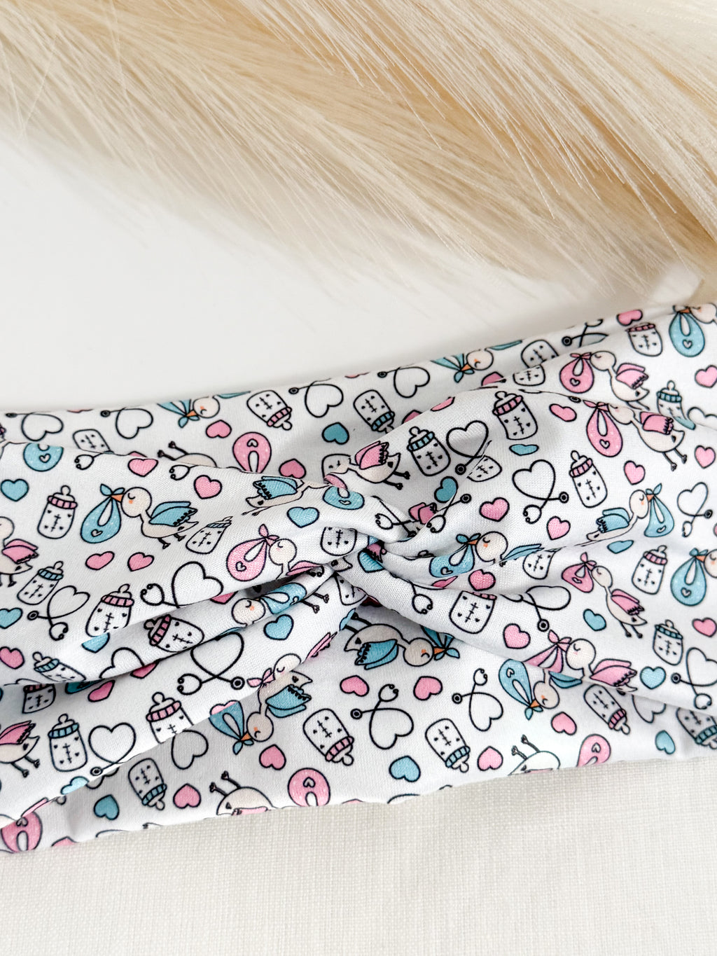 Baby stork print twist headband for labor & delivery nurses – handmade by Headband Studio