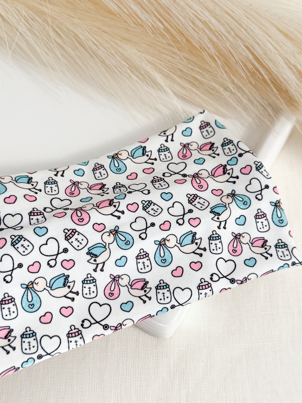 Baby stork print twist headband for labor & delivery nurses – handmade by Headband Studio
