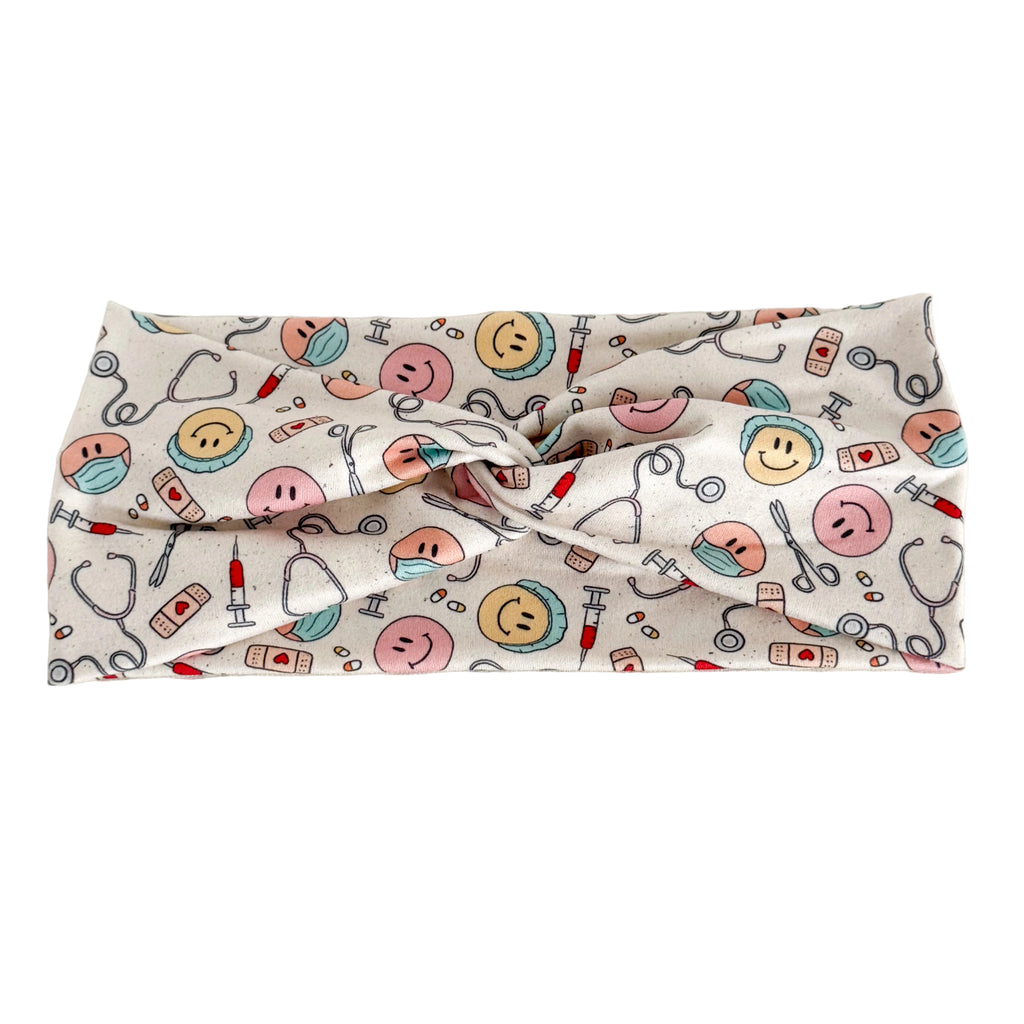 Medical smiles print twist headband for nurses and healthcare workers – handmade by Headband Studio