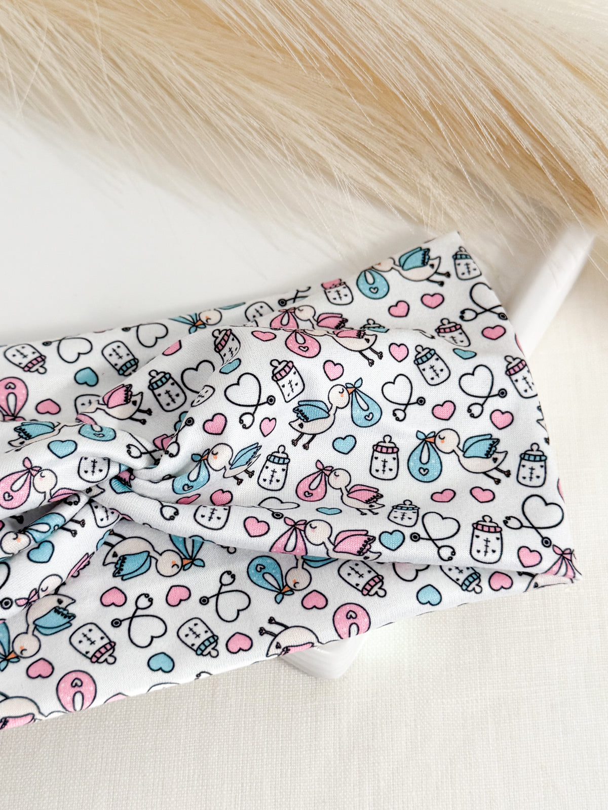 Baby stork print twist headband for labor & delivery nurses – handmade by Headband Studio
