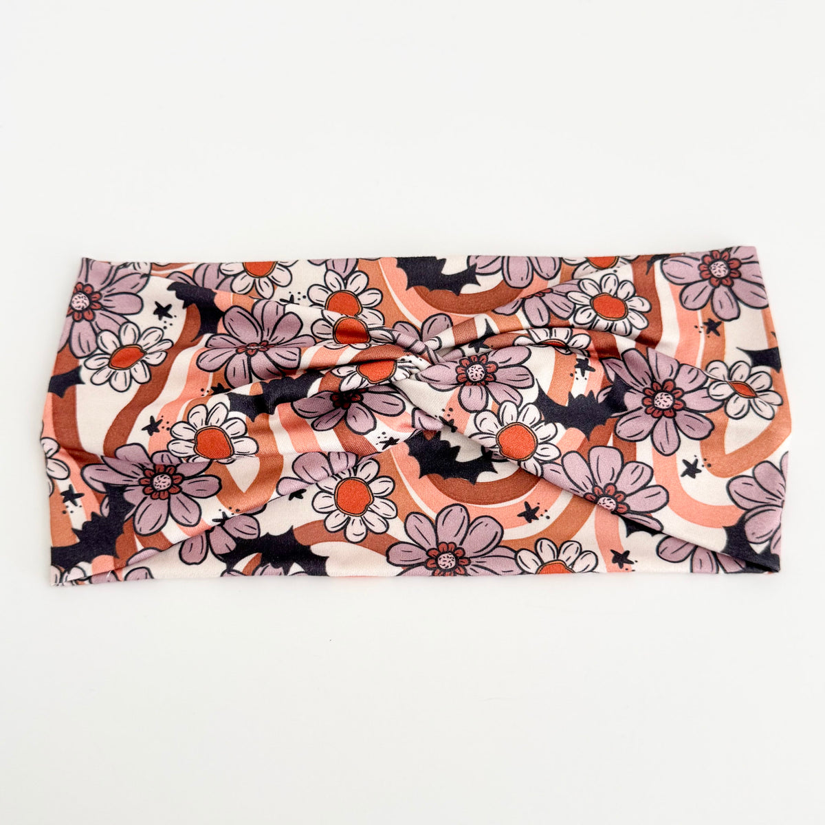 Floral Bats twist headband with bats among retro daisies and rainbows