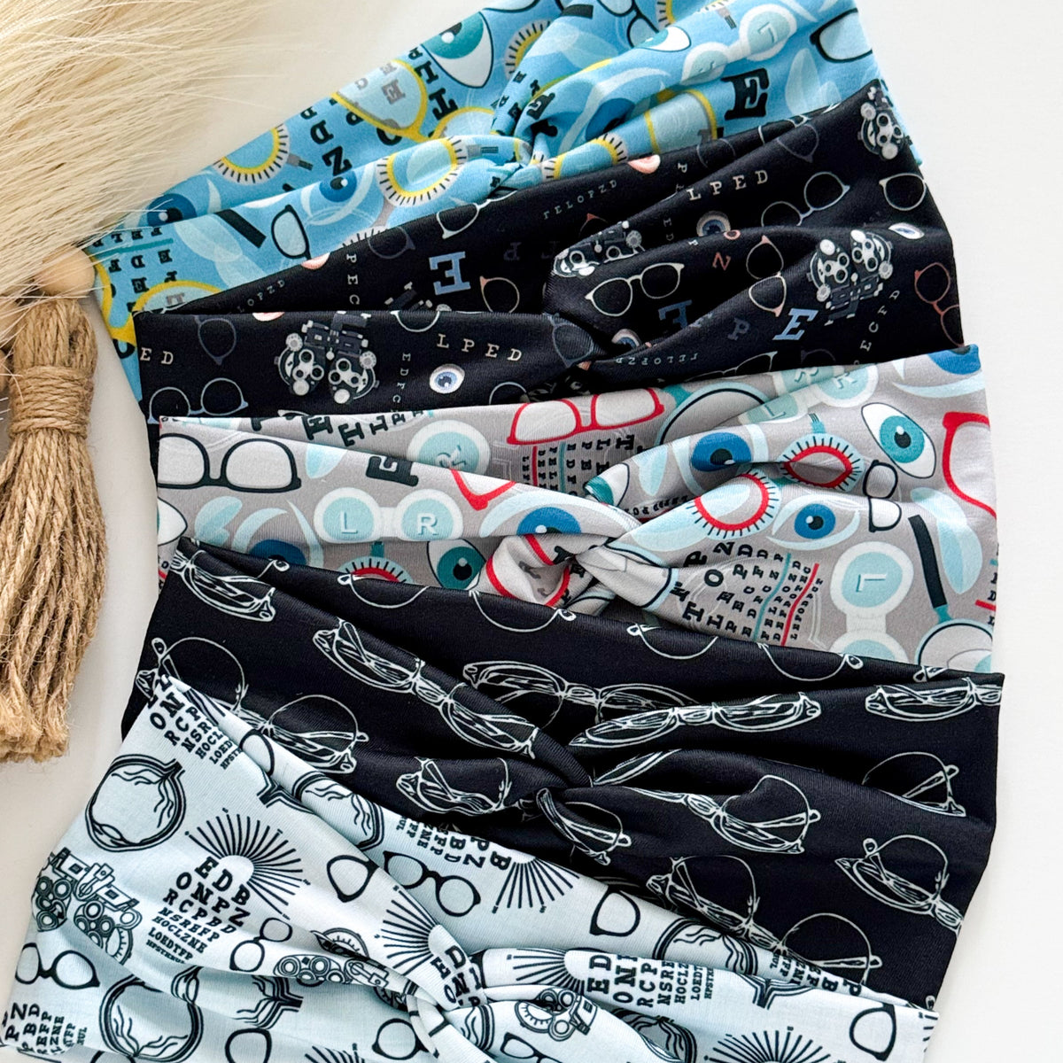 Eyeglasses and eye chart print twist headband for eye care professionals – handmade by Headband Studio