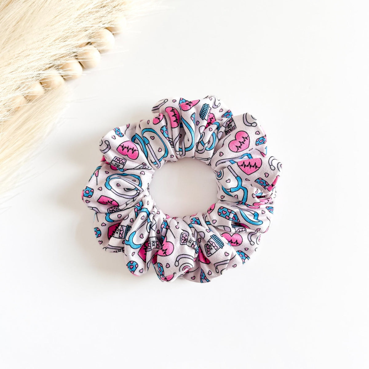 Pink nurse-print scrunchie, handmade hair accessory for nurses – handmade by Headband Studio