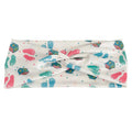 Headband with colorful baby footprint and block pattern on a white background