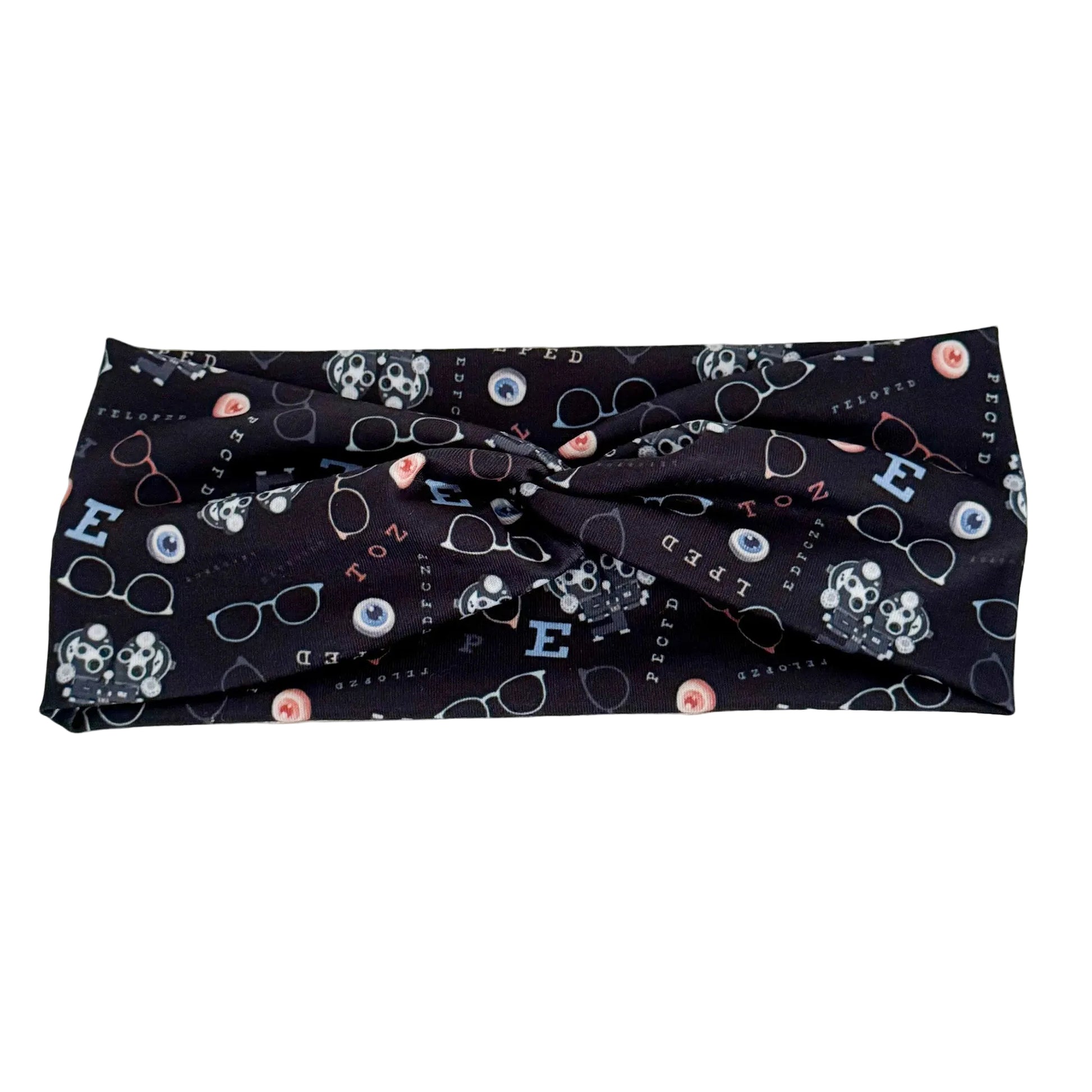 Black headband with eyeglass and letter pattern on a white background