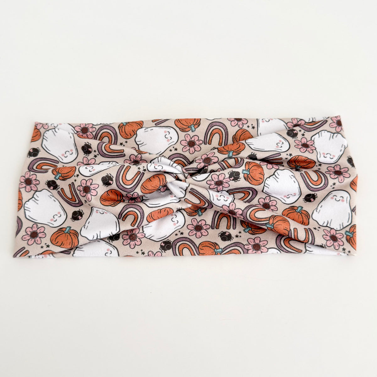Rainbow Ghost twist headband with ghosts, rainbows and pumpkins on beige