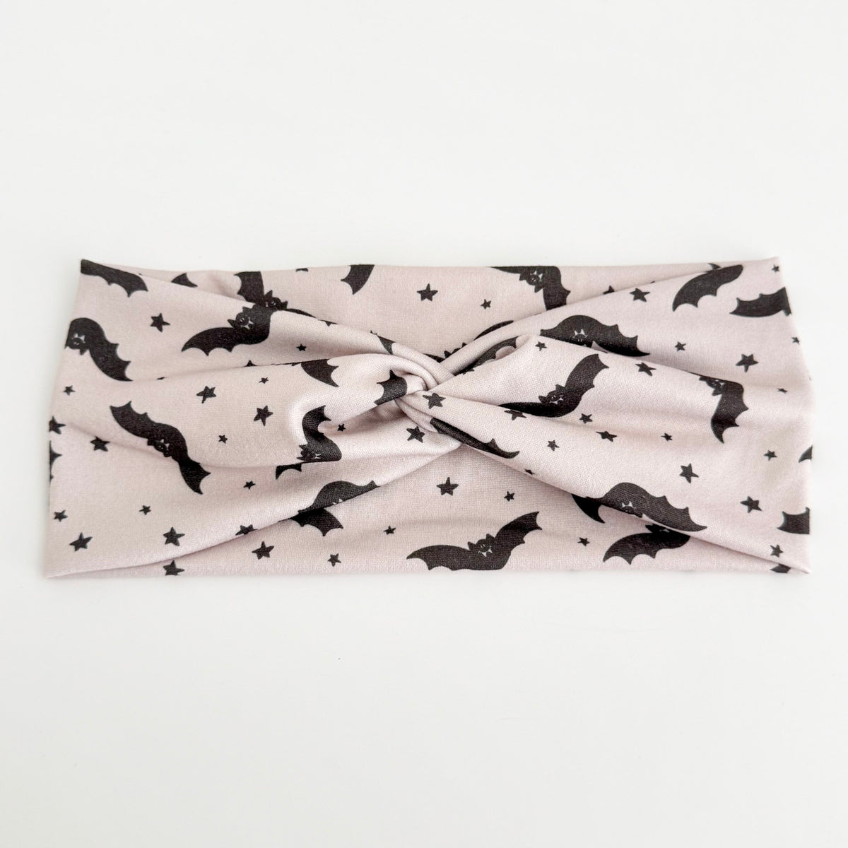 Starry Bats twist headband with black bats and stars on cream
