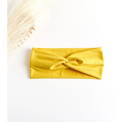 Yellow headband on a white background