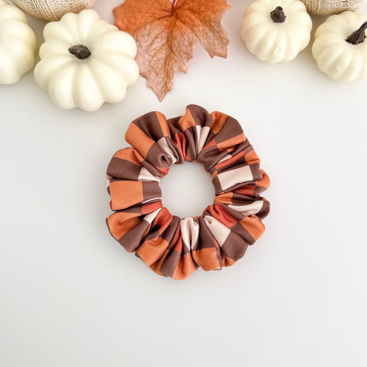 Brown Checkers scrunchie in rust, brown and cream checkerboard