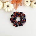 Fall Floral scrunchie with rust flowers and leaves on navy