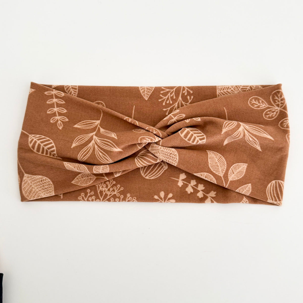 Fall Icons twist headband with cream leaf line art on caramel brown