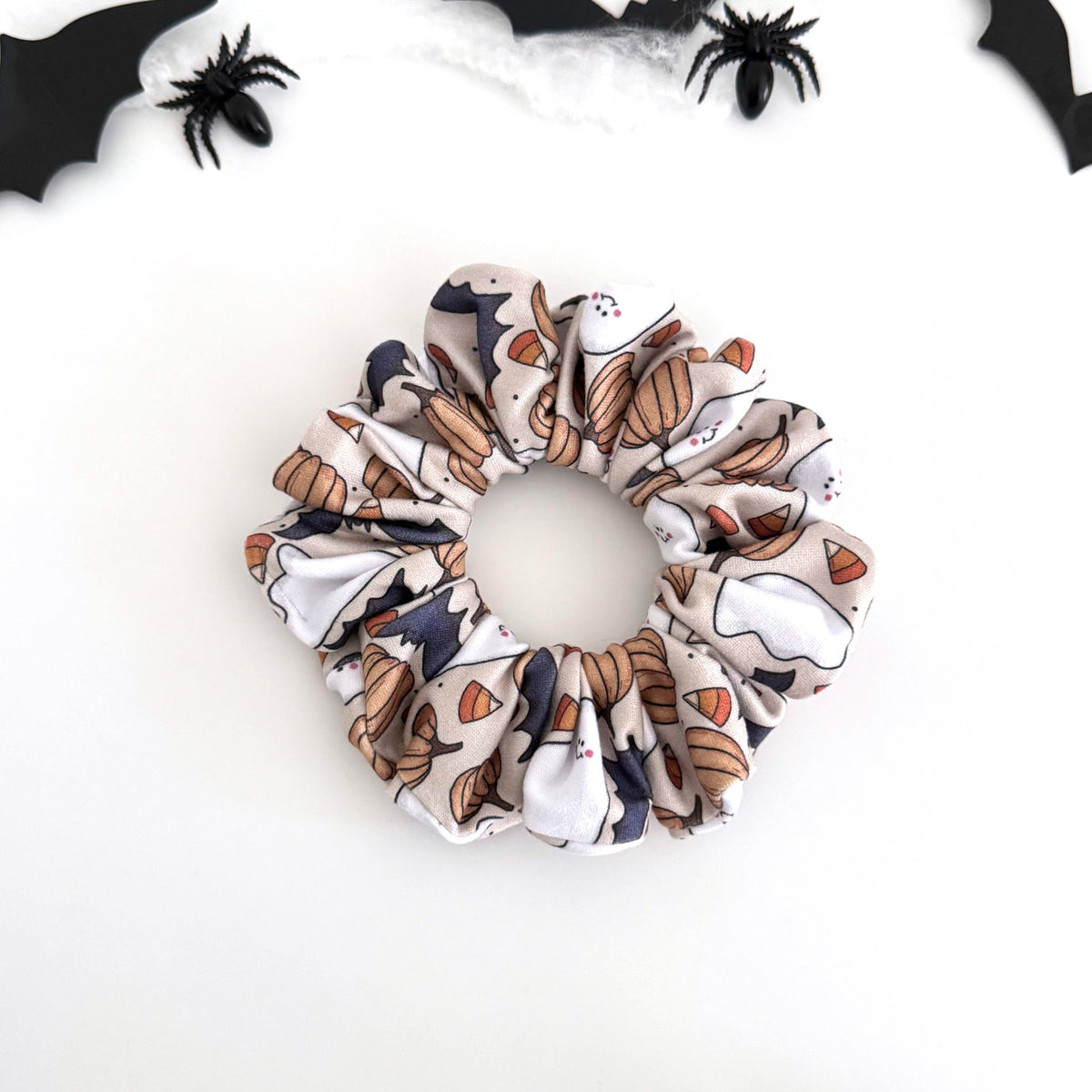 Ghost and Pumpkins scrunchie with ghosts, pumpkins and bats on beige