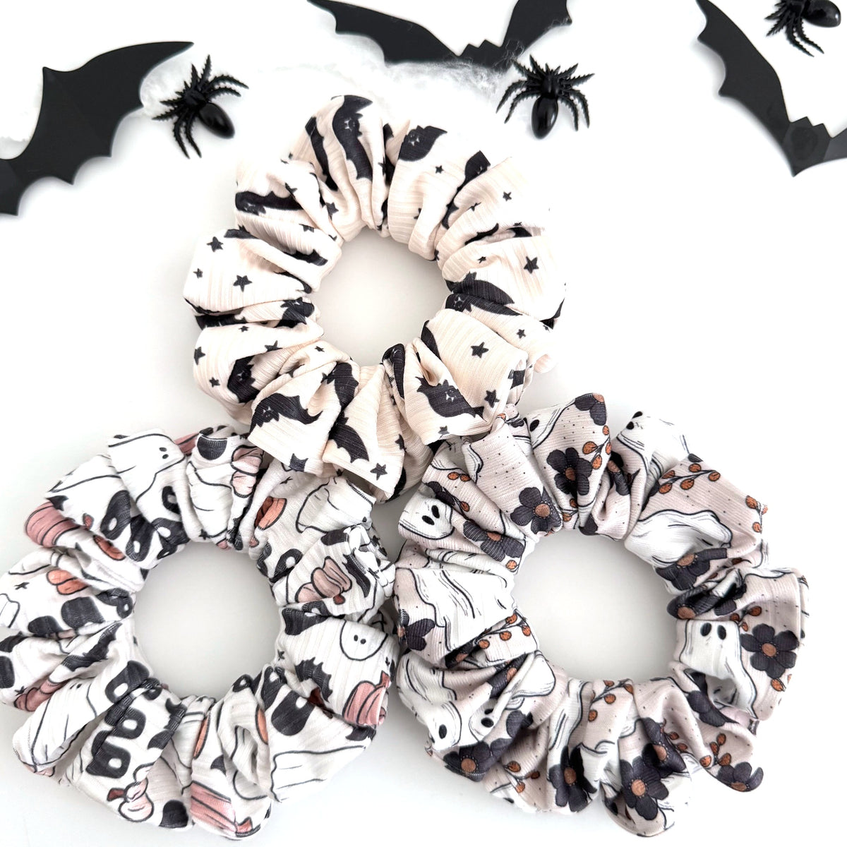 Three Halloween scrunchies: Cream Bats and Stars, Boo and Ghostly Garden