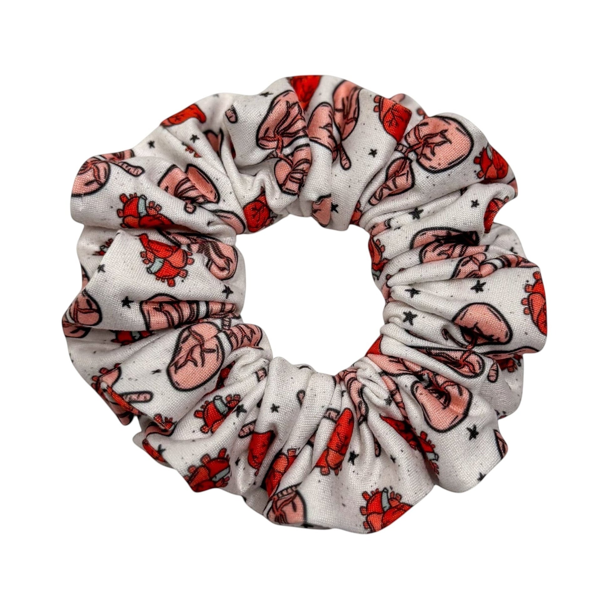 Headband Studio white scrunchie with red anatomical heart and star print, made of soft polyester for medical professionals.