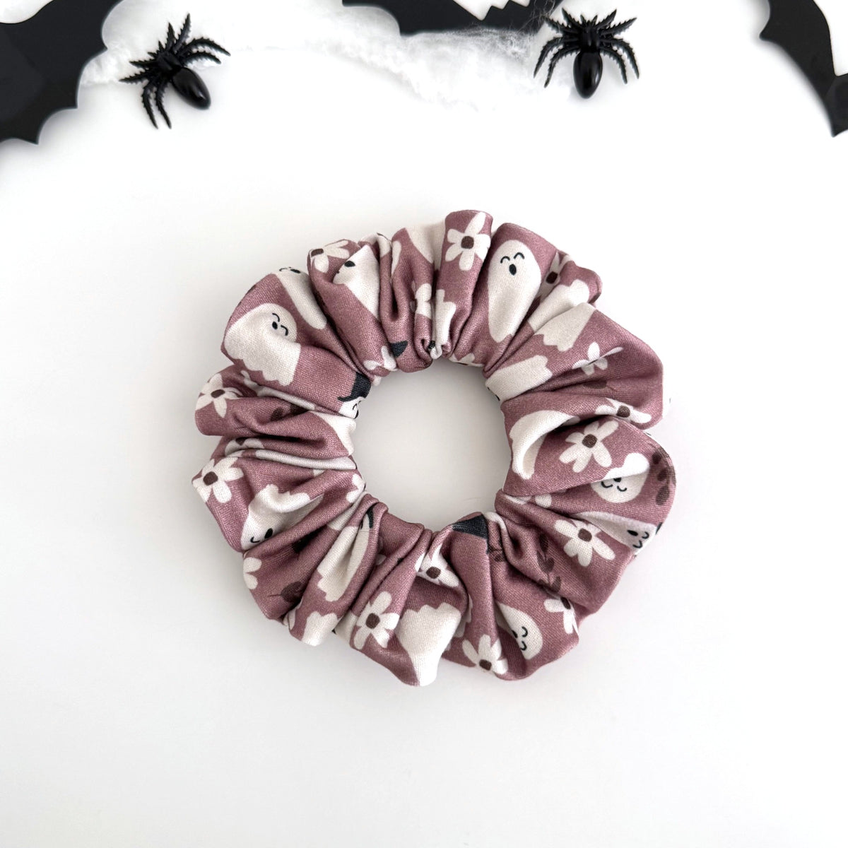 Pink Ghost scrunchie with white ghosts and tiny flowers on dusty mauve