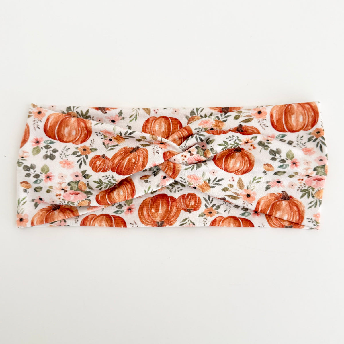 Pumpkin Pink Flowers twist headband with orange pumpkins and pink flowers on cream